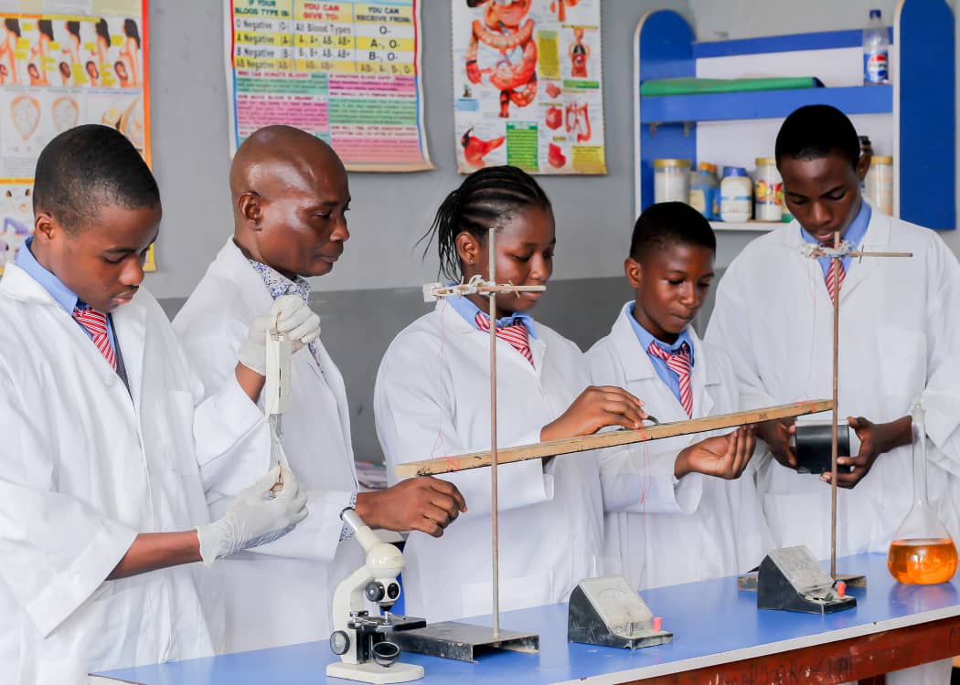 Students conducting science experiments at Veeky and Veeky School